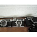 Three Yashica cameras, a Lynx 5000 and two Minister