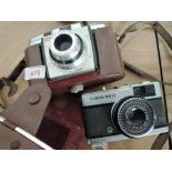 A Kodak Coloursnap 35 camera and an Olympus Trip 35