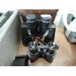 A pair of Swift Saratoga 8x40 Binoculars and a pair of Radium Prismoid Binoculars