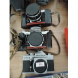 Three Praktica cameras, two Super TL, and a LTL