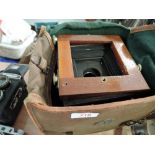 A bag of Mahogany field camera parts