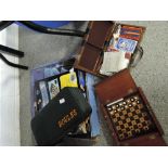 A selection of vintage board and travel games including folding wooden chess set