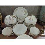 A selection of vintage tea cups and saucers un marked hand decorated