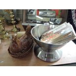 A selection of vintage kitchen items including hen egg nest