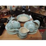 A selection of vintage tea cups and saucers in baby blue