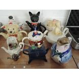 A selection of collectable novelty teapots