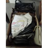 A box of ladies fashion handbags of various styles