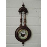 A carved frame barometer, thermometer