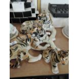 A selection of vintage tiger figures and studies