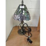 A Tiffany style table lamp and shade