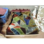 A vintage velvet patchwork chair back cover and settee back cover having cross stitch detail and