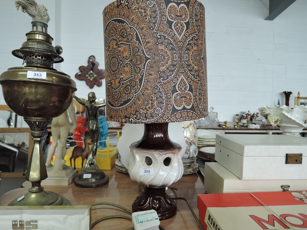 A vintage German style ceramic table lamp and shade