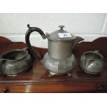 A Liberty's Tudric pewter sugar and cream jug numbered 01075 and a civic pewter teapot