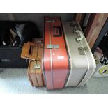 Two vintage suitcases and a vintage ladies vanity case