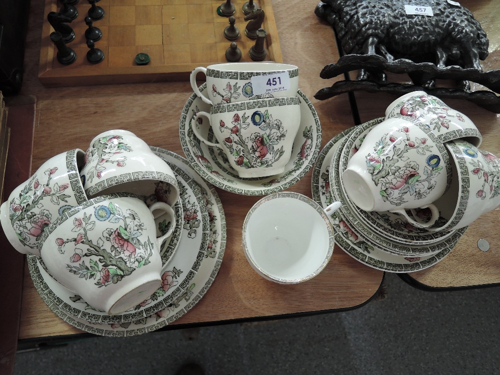 A selection of vintage tea cups and saucers with Indian Tree pattern