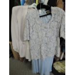 A lady's dove grey skirt suit by Jobis, size 14 and a pale blue skirt suit by Gina Bacconi having