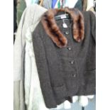 A ladies 1940's brown boucle skirt suit with fur collar, faux silver fox fur jacket and vintage