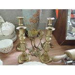 A selection of vintage brass cast candle sticks