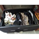 A suitcase containing a selection of ladies clothing and shoes including Jerry Webber
