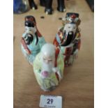 Three ceramic Chinese oriental figures, wisdom, wealth and old age
