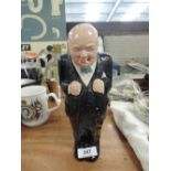 A vintage plaster cast figure of Winston Churchill hand decorated