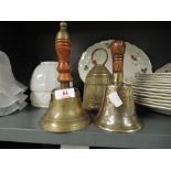 A selection of vintage brass cast door and similar brass bells