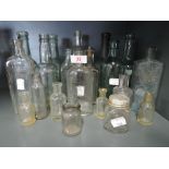 A selection of vintage green and clear bottles