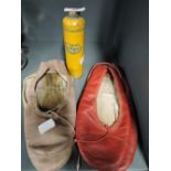 A selection of vintage dancing or ballet shoes in pink and red leather