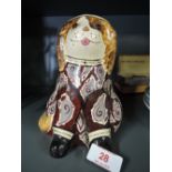 A vintage ceramic dog figure with hand decorated bohemian print marked c 121 Cherry Scott Keswick