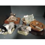 A selection of vintage resin cast animal figures and figurines