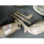 A selection of vintage clay pipes some of large pressed form