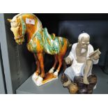 A selection of vintage Chinese ceramics including mudman and tang style horse