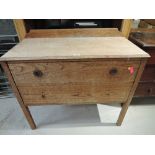 A vintage oak side table with drawer set