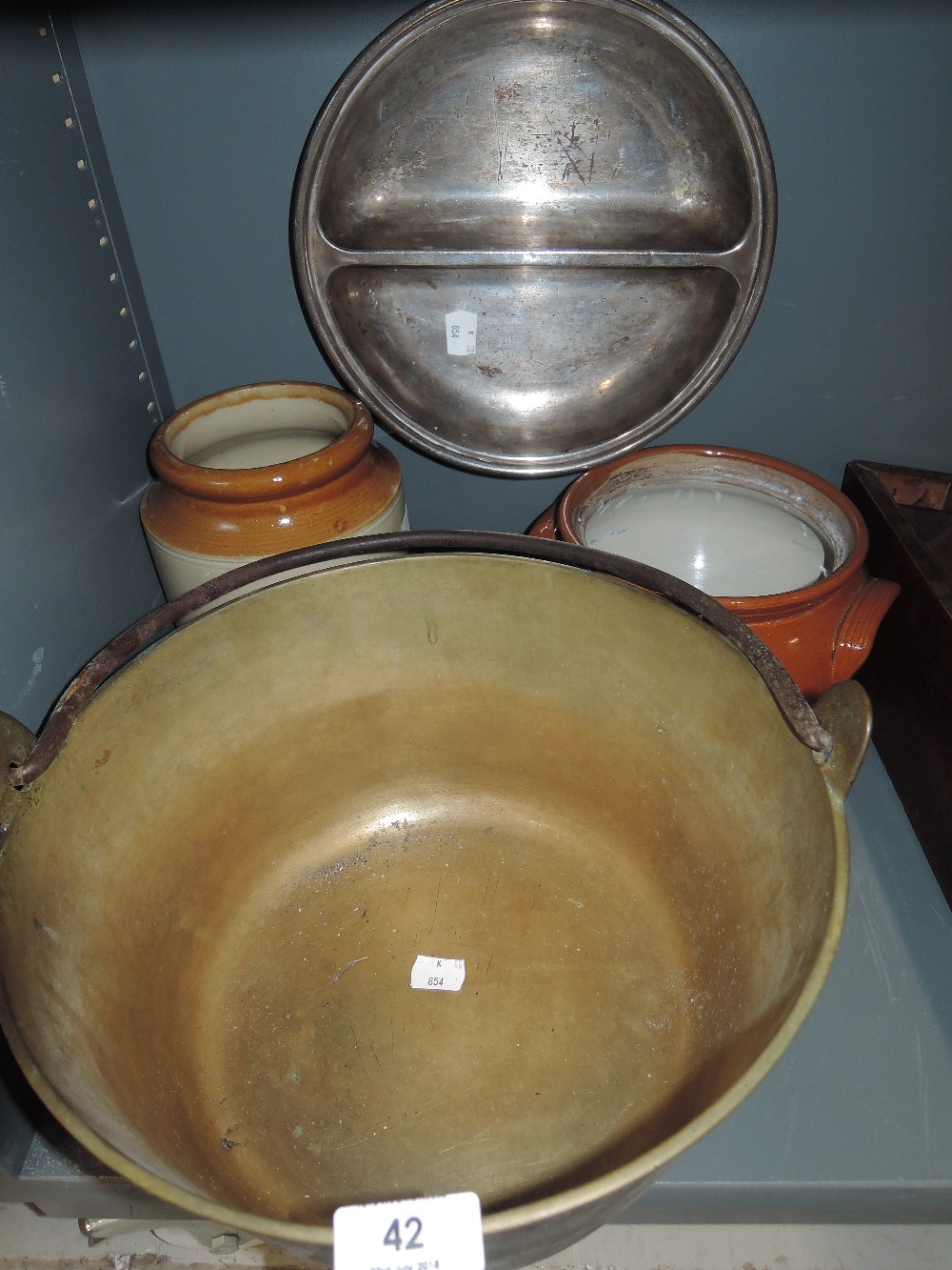 A vintage brass cast jam pan and stone ware jars