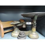 A set of vintage balance scales and weight set