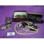 A small selection of costume jewellery, coins and yellow metal pincette glasses