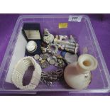 A box of misc and costume jewellery including coin bracelet, twist bangle, miniature ornaments, vase