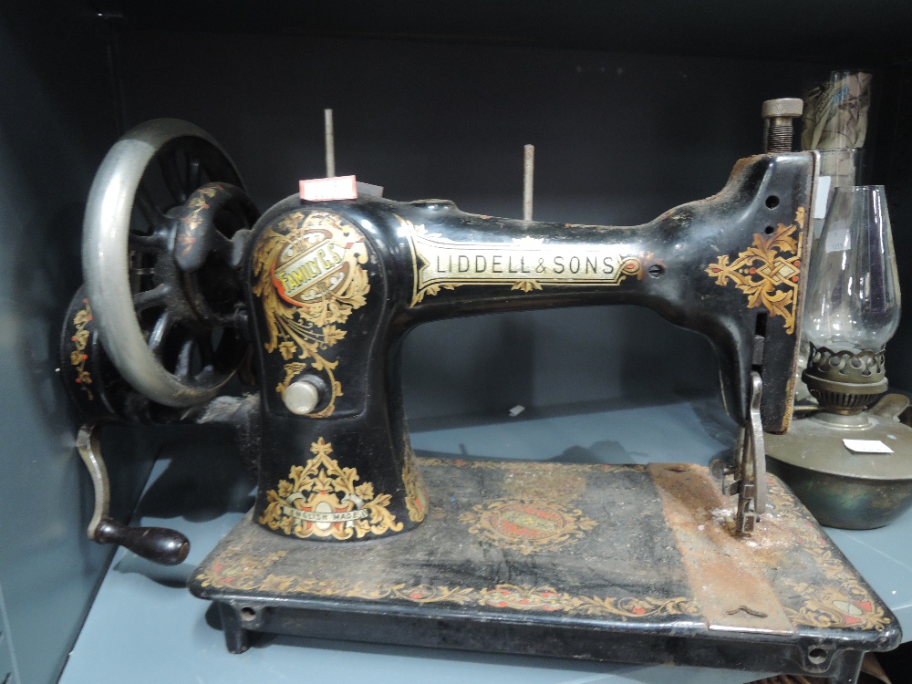 A vintage Liddell and sons of Haltwhistle Northumberland hand cranked sewing machine with printed