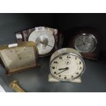 A selection of vintage clockwork and mantle clocks including Westclox