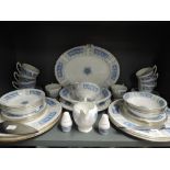 A vintage part dinner service by Coalport in the Revelry pattern
