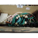 A small selection of costume jewellery including loose beads etc