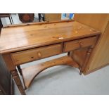 A modern pine desk unit or hall way table with integral drawers