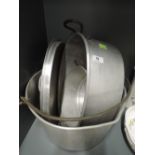 A selection of vintage kitchen items including aluminium jam pan