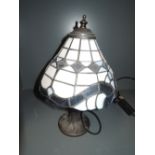 A modern tiffany style table lamp with leaded light shade