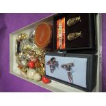A selection of costume jewellery including hat pins, cufflinks and brooches etc