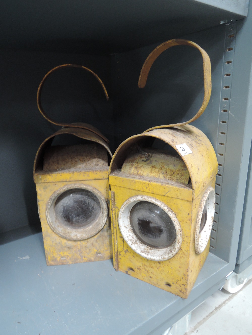 Two vintage industrial style lamps yellow painted bodys marked Kilner