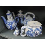 A selection of vintage Chinese tea pots with unusual forms