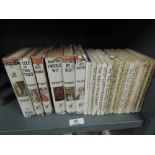 A selection of vintage childrens story books by Beatrix Potter some early editions most playworn
