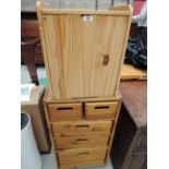 A set of modern pine drawers and hamper style box