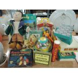 A selection of vintage toys and games including Fisherprice